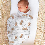 Personalised muslin swaddle wrap with baby name, soft breathable fabric, 120x120cm, gentle for newborns, machine washable baby blanket.