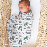 Personalised muslin swaddle wrap with baby name, soft breathable fabric, 120x120cm, ideal for newborns and gifts