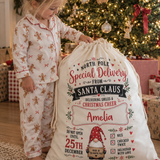 Personalised North Pole gnome Christmas sack, durable fabric sack with drawstring