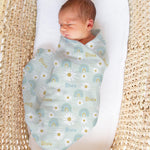 Personalised muslin swaddle wrap with baby name, soft breathable fabric, 120x120cm, perfect for newborns and machine washable