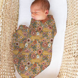 Personalised muslin swaddle wrap with baby’s name, soft breathable fabric, 120x120cm size for newborns.