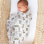 Personalised muslin swaddle wrap with baby name printed, soft breathable fabric, 120x120cm, gentle for newborns and machine washable
