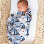 Personalised muslin swaddle wrap with baby name, soft breathable fabric, sized 120x120cm for newborn comfort and gifts