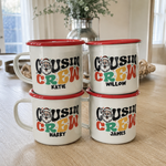 Four matching Santa Cousin Crew enamel mugs with red rims, a different cousin's name on each
