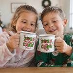 Two children holding 2026 Christmas Crew enamel mugs personalised with their own names