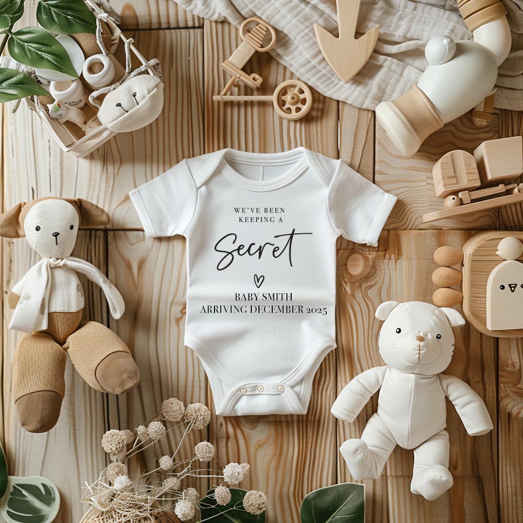 We've Been Keeping A Secret Onesie