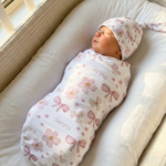 Personalised swaddle blanket and beanie set made from stretch poly fabric for newborn comfort and style