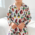 Long sleeve personalised kids pyjamas with all-over print and child's name, soft breathable fabric, and matching pants.