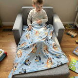 Soft personalised baby blanket with edge-to-edge printed design and plain white reverse side.