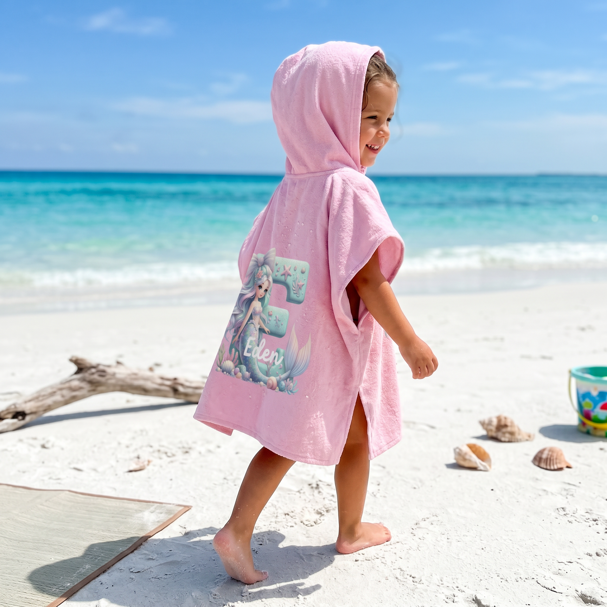 Personalised mermaid hooded towel with a custom initial for bath time