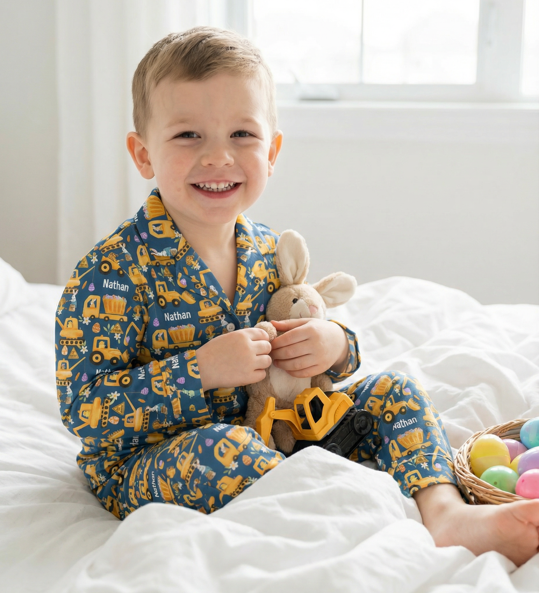 Personalised kids' long sleeve Easter pyjamas with all-over festive print and custom name