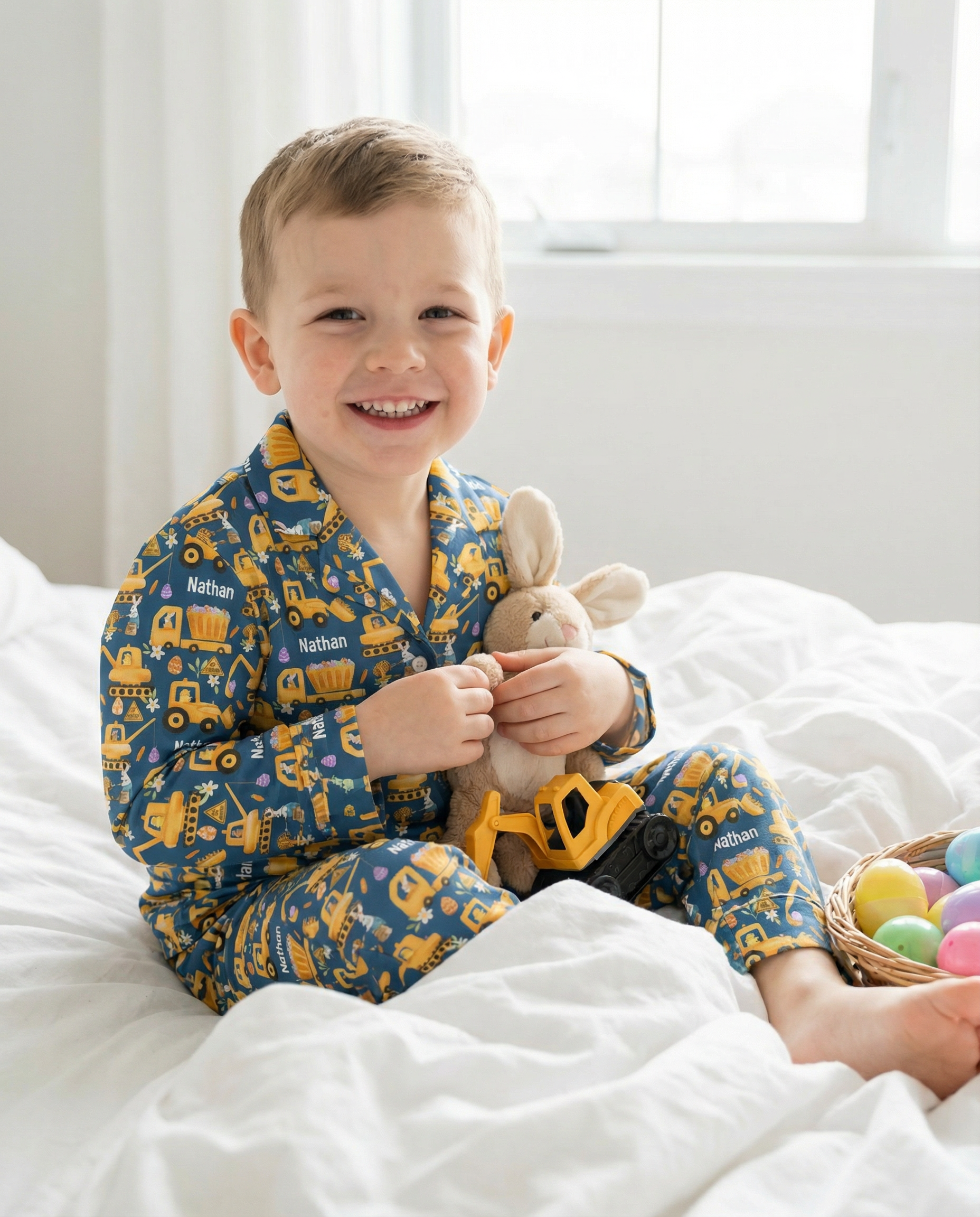 Personalised kids' long sleeve Easter pyjamas with all-over festive print and custom name