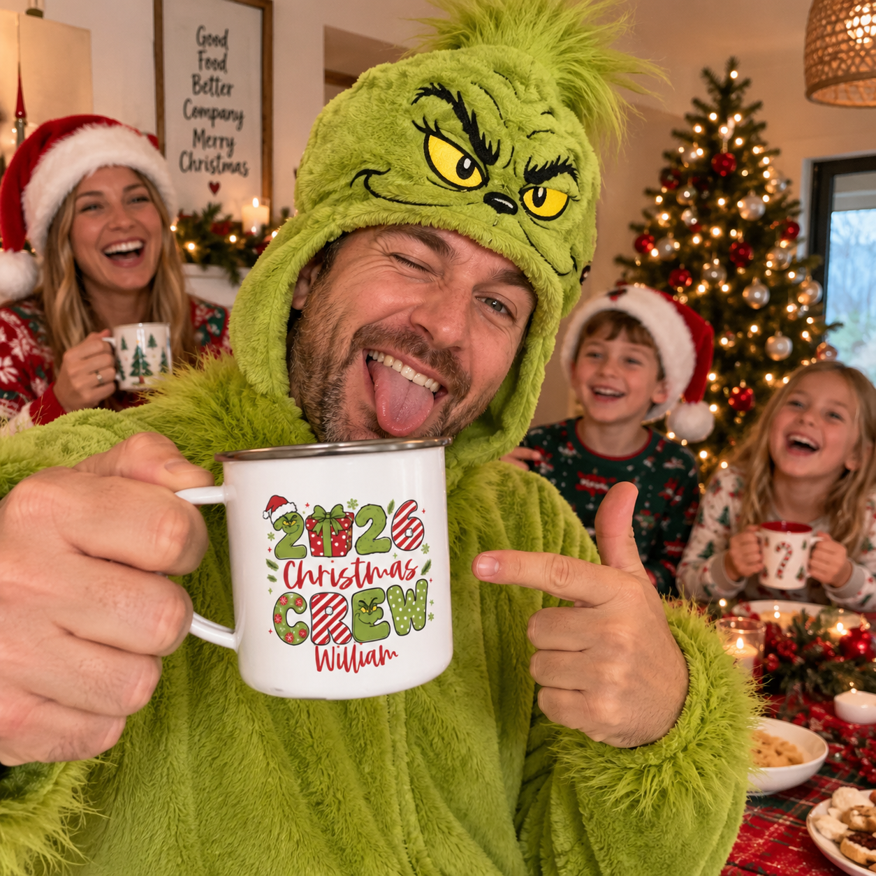 Dad in a green Grinch onesie holding his personalised 2026 Christmas Crew enamel mug - The Custom Co