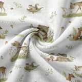 Personalised muslin swaddle wrap with baby name, lightweight breathable fabric, 120x120cm size for newborn comfort and versatile use.