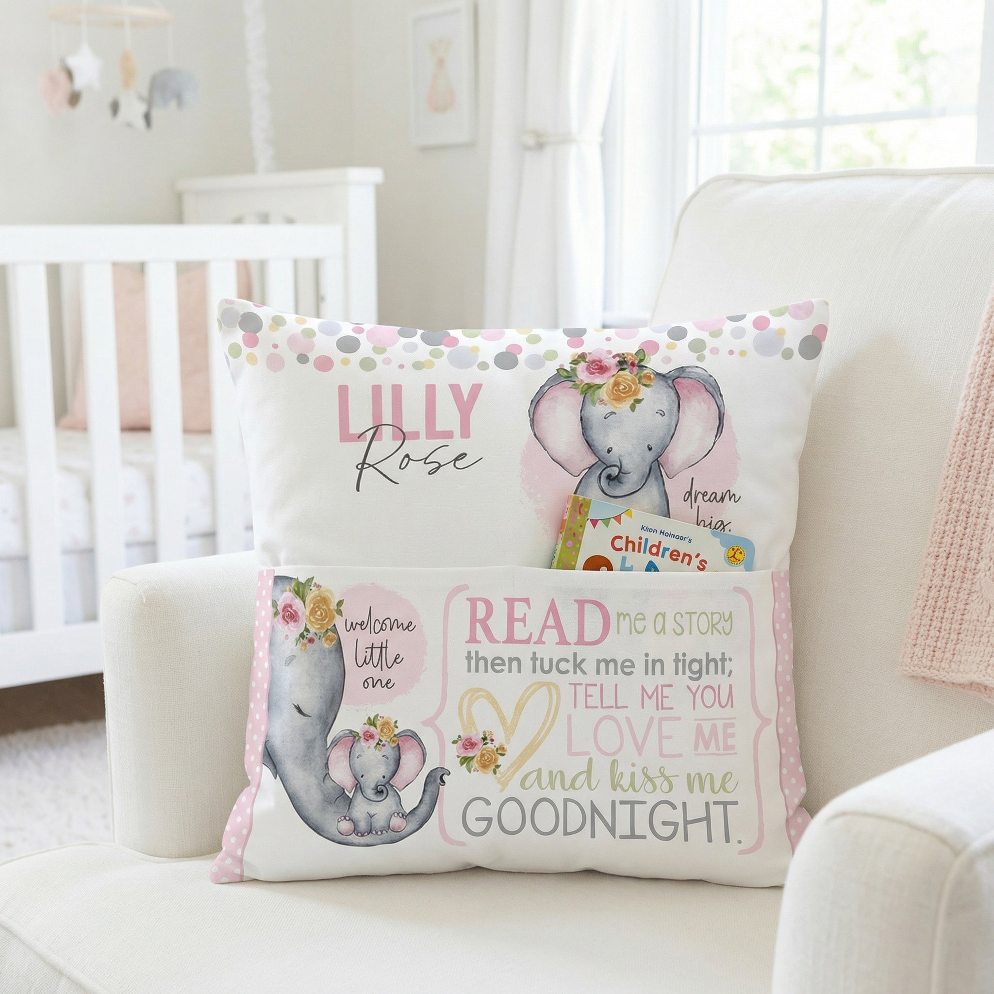 Personalised pink baby elephant pocket book cushion with built-in book pocket and child's name on front