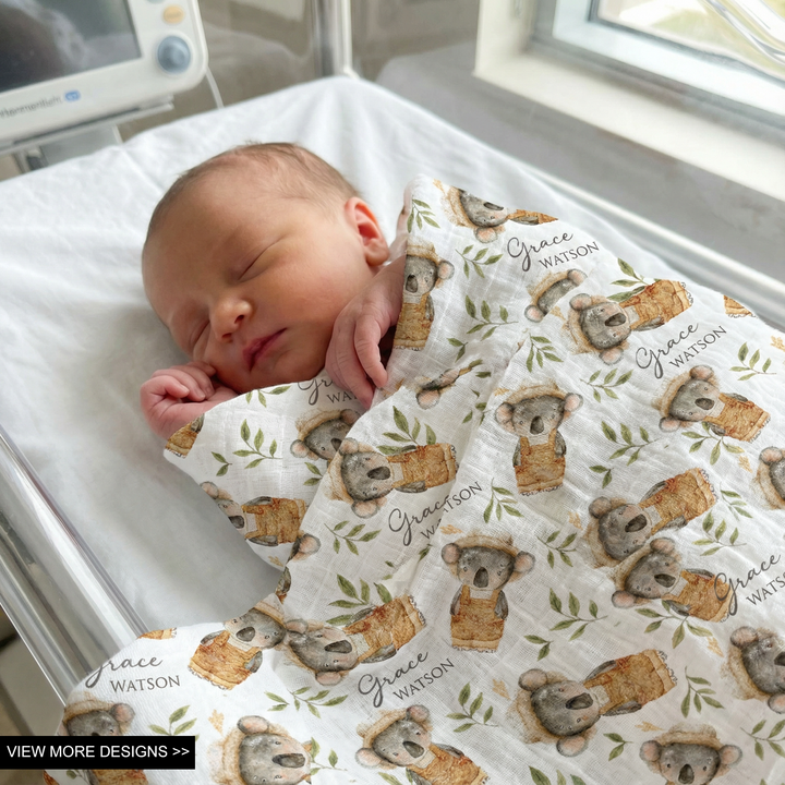 Custom muslin swaddle wrap personalized with baby’s name, breathable soft fabric, 120x120cm size for newborns and babies.