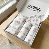 Personalised Newborn Essentials Gift Bundle with minky blanket, jersey swaddle, beanie, muslin swaddle, and 6-in-1 nursing cover baby box